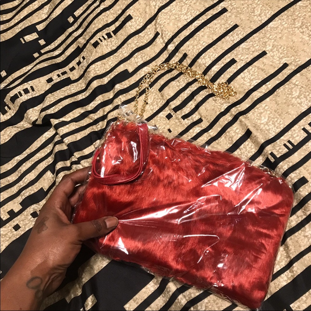 Red crossbody purse with gold chain